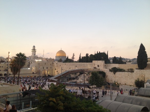 The Western Wall with the iconic temple mount and the beautiful golden Dome of the Rock