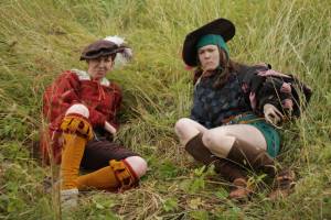 Two knechts taking a break in the grass. Webel Ilseke Kapmeyer and Gefreiter Bärbel Rosenwasser. Pre-larp prepartion. Photo: Lisa Tegelmark